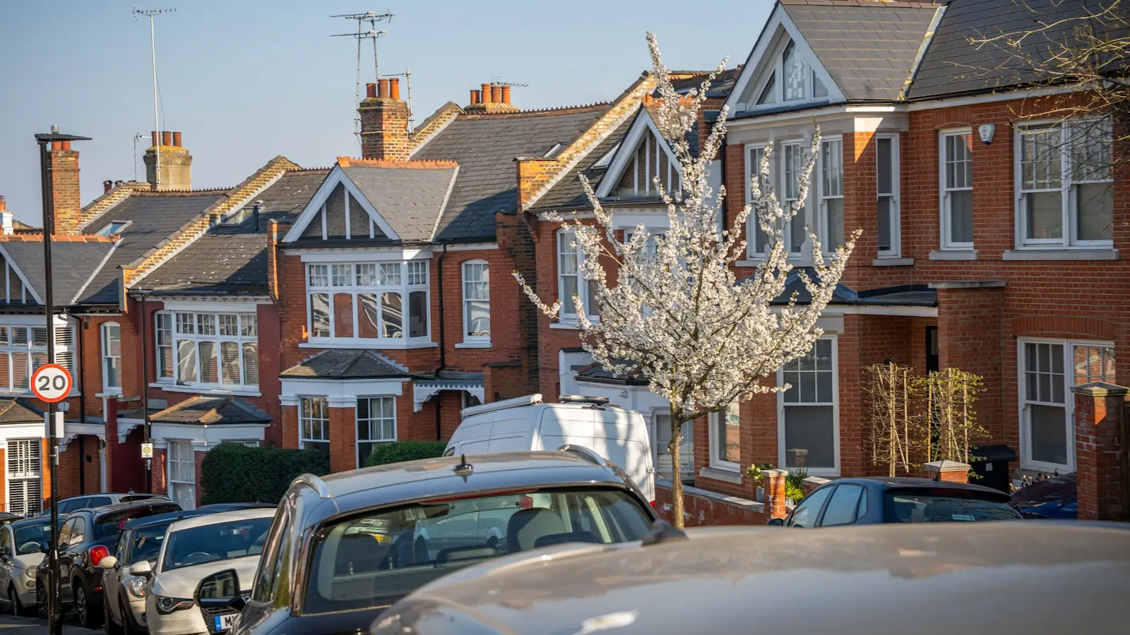 A row of London brick terraced houses, where the distance to a school gate can change from one year to the next.