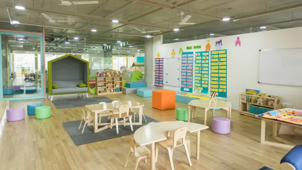 Wooden letters and play dough on a preschool classroom table